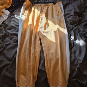 Puma Orange  Joggers with White Stripes